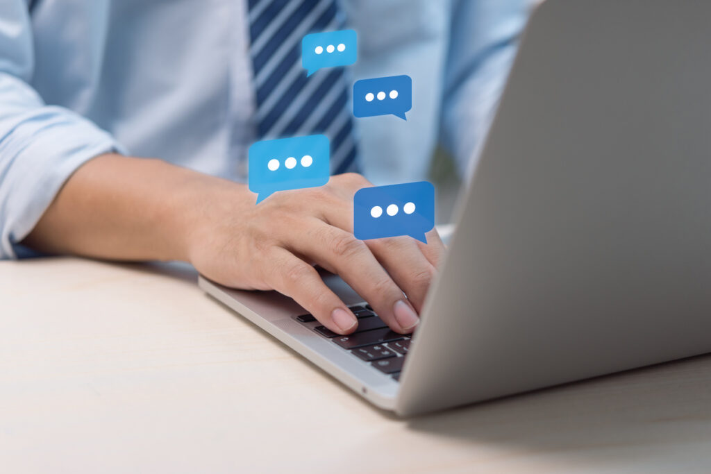 diagramatic comments over a hand on a laptop keyboard