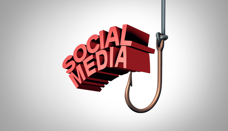 large block writing saying social media on the end of a hook